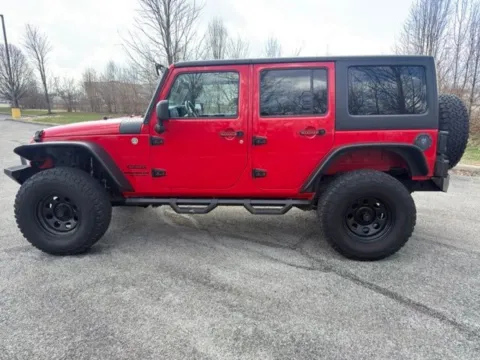 Another view of 2015 Jeep Wrangler Unlimited Sport for sale in Indianapolis, IN at Indy Luxury Motorsports