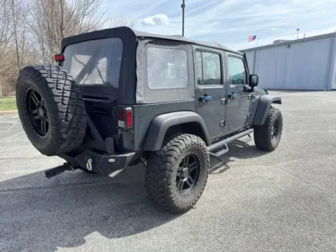 Another view of 2016 Jeep Wrangler Unlimited Sport for sale in Indianapolis, IN at Indy Luxury Motorsports
