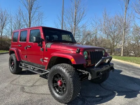 Photos of 2013 Jeep Wrangler Unlimited Sahara for sale in Indianapolis, IN at Indy Luxury Motorsports