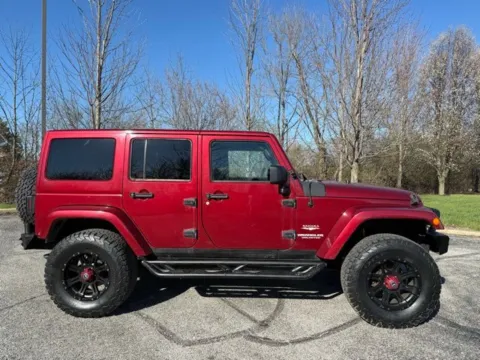 Another view of 2013 Jeep Wrangler Unlimited Sahara for sale in Indianapolis, IN at Indy Luxury Motorsports
