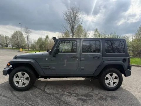 Another view of 2014 Jeep Wrangler Unlimited Sport for sale in Indianapolis, IN at Indy Luxury Motorsports