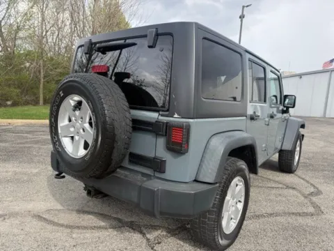 Another view of 2014 Jeep Wrangler Unlimited Sport for sale in Indianapolis, IN at Indy Luxury Motorsports