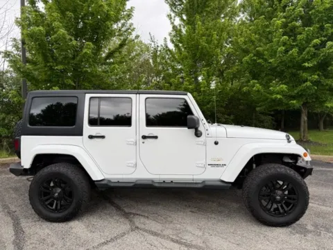 Photos of 2014 Jeep Wrangler Unlimited Sahara for sale in Indianapolis, IN at Indy Luxury Motorsports