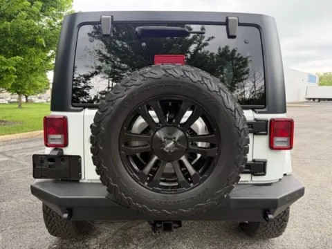 More photos of 2014 Jeep Wrangler Unlimited Sahara at Indy Luxury Motorsports, IN