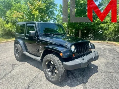 Black 2011 Jeep Wrangler Sahara for sale in Indianapolis, IN