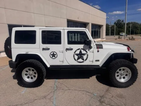 Photos of 2014 Jeep Wrangler Unlimited Sahara for sale in Indianapolis, IN at Indy Luxury Motorsports