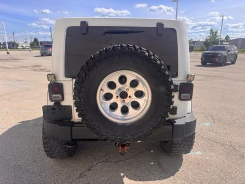 More photos of 2014 Jeep Wrangler Unlimited Sahara at Indy Luxury Motorsports, IN