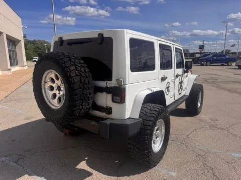 Another view of 2014 Jeep Wrangler Unlimited Sahara for sale in Indianapolis, IN at Indy Luxury Motorsports