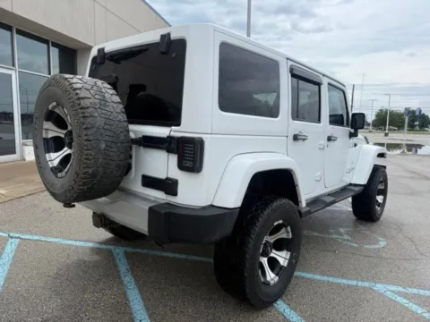 Another view of 2014 Jeep Wrangler Unlimited Sahara for sale in Indianapolis, IN at Indy Luxury Motorsports