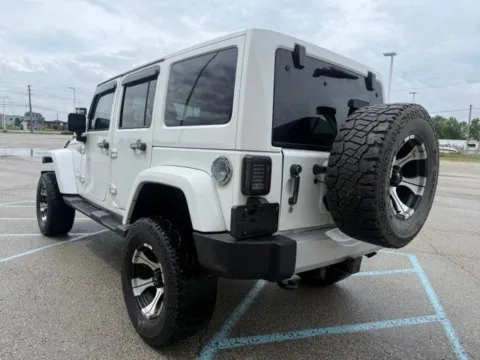 More photos of 2014 Jeep Wrangler Unlimited Sahara at Indy Luxury Motorsports, IN
