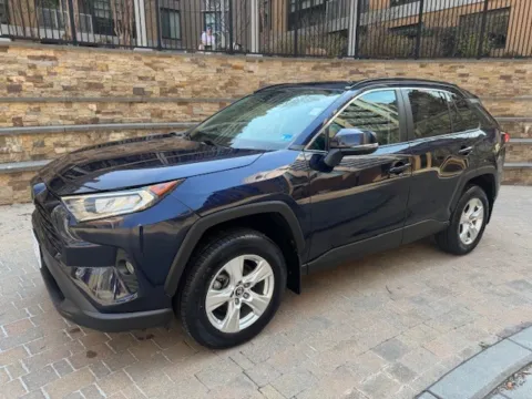 Blue 2020 TOYOTA RAV4 XLE for sale in Arlington, VA