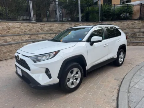 White 2021 TOYOTA RAV4 XLE for sale in Arlington, VA