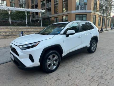 White 2023 TOYOTA RAV4 HYBRID XLE for sale in Arlington, VA