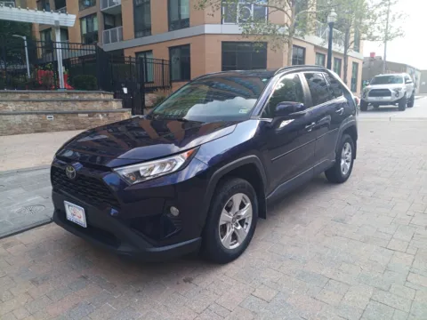 Blue 2021 TOYOTA RAV4 XLE for sale in Arlington, VA