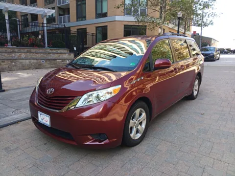 Red 2017 TOYOTA SIENNA LE for sale in Arlington, VA