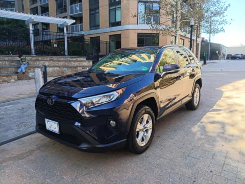 Blue 2021 TOYOTA RAV4 XLE for sale in Arlington, VA
