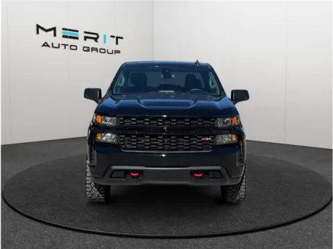 Photos of 2021 Chevrolet Silverado 1500 Crew Cab Custom Trail Boss Pickup 4D 5 3/4 ft for sale in Jacksonville, FL at Merit Auto Group Atlantic