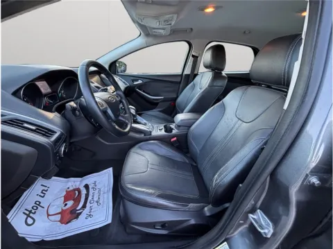 Photos of 2014 Ford Focus Titanium Hatchback 4D for sale in Jacksonville, FL at Merit Auto Group Atlantic