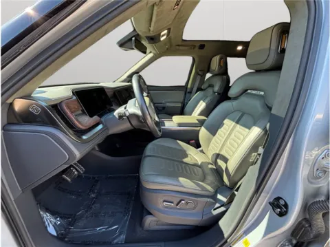 Photos of 2022 Rivian R1T Adventure Pickup 4D 4 1/2 ft for sale in Jacksonville, FL at Merit Auto Group Atlantic