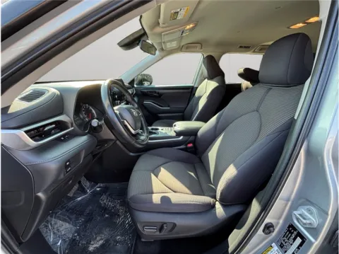 Photos of 2022 Toyota Highlander LE Sport Utility 4D for sale in Jacksonville, FL at Merit Auto Group Atlantic