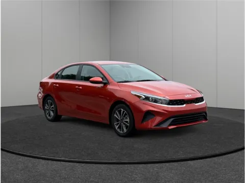 Orange 2023 Kia Forte LXS Sedan 4D for sale in Jacksonville, FL