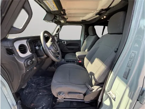 Photos of 2024 Jeep Wrangler 4xe Sport S 4xe Sport Utility 4D for sale in Jacksonville, FL at Merit Auto Group Atlantic