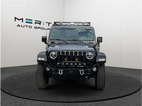 Another view of 2022 Jeep Wrangler Unlimited Willys Sport Utility 4D for sale in Jacksonville, FL at Merit Auto Group Atlantic