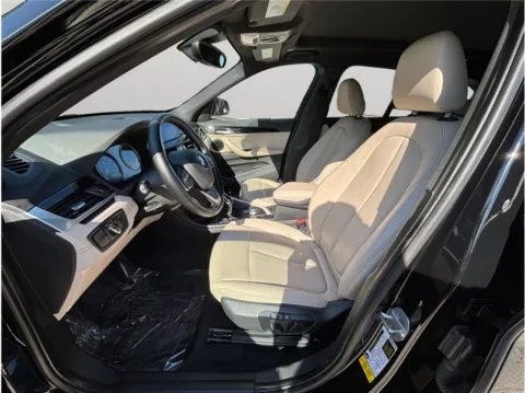 Photos of 2021 BMW X1 sDrive28i Sport Utility 4D for sale in Jacksonville, FL at Merit Auto Group Atlantic