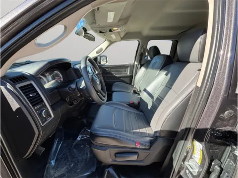 Photos of 2024 Ram 1500 Classic Quad Cab Tradesman Pickup 4D 6 1/3 ft for sale in Jacksonville, FL at Merit Auto Group Atlantic