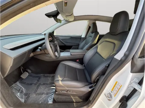 Photos of 2026 Tesla Model Y Long Range Sport Utility 4D for sale in Jacksonville, FL at Merit Auto Group Atlantic