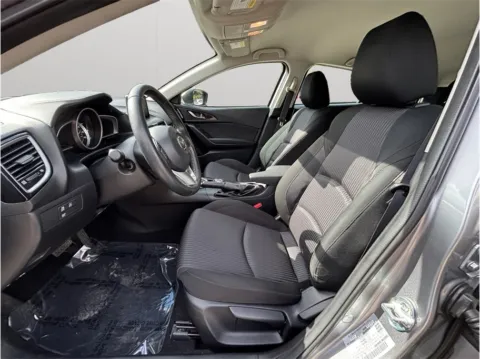 Photos of 2014 Mazda MAZDA3 i Touring Hatchback 4D for sale in Jacksonville, FL at Merit Auto Group Atlantic