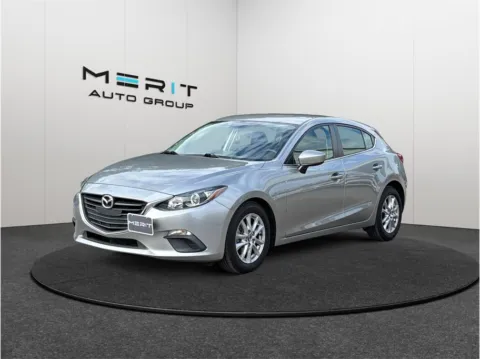 More photos of 2014 Mazda MAZDA3 i Touring Hatchback 4D at Merit Auto Group Atlantic, FL