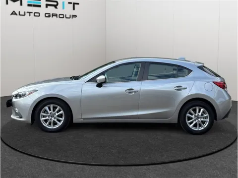 More photos of 2014 Mazda MAZDA3 i Touring Hatchback 4D at Merit Auto Group Atlantic, FL