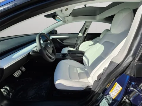 Photos of 2021 Tesla Model 3 Performance Sedan 4D for sale in Jacksonville, FL at Merit Auto Group Atlantic