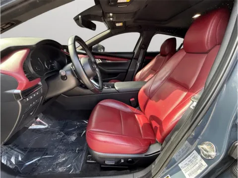 Photos of 2022 Mazda MAZDA3 Premium Plus Hatchback 4D for sale in Jacksonville, FL at Merit Auto Group Atlantic