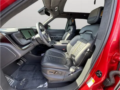 Photos of 2023 Rivian R1S Adventure Sport Utility 4D for sale in Jacksonville, FL at Merit Auto Group Atlantic