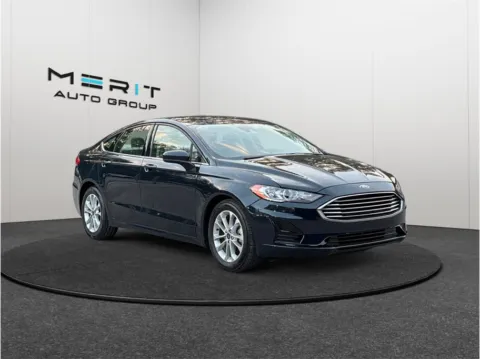 Blue 2020 Ford Fusion SE Sedan 4D for sale in Jacksonville, FL