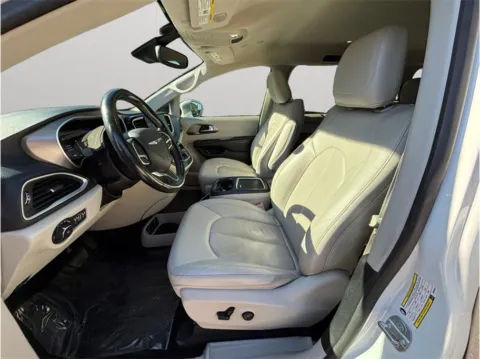 Photos of 2021 Chrysler Pacifica Touring L Minivan 4D for sale in Jacksonville, FL at Merit Auto Group Atlantic