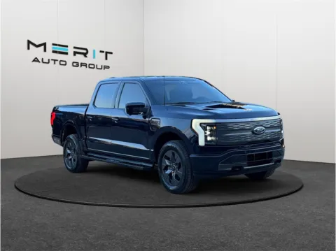 Blue 2022 Ford F-150 Lightning Lariat Pickup 4D 5 1/2 ft for sale in Jacksonville, FL