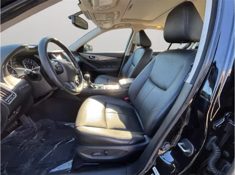 Photos of 2015 Infiniti Q50 3.7 Premium Sedan 4D for sale in Jacksonville, FL at Merit Auto Group Atlantic