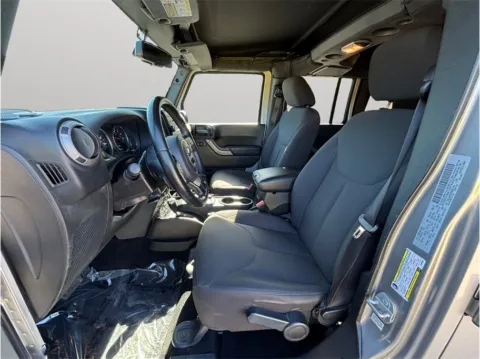 Photos of 2017 Jeep Wrangler Unlimited Sport SUV 4D for sale in Jacksonville, FL at Merit Auto Group Atlantic