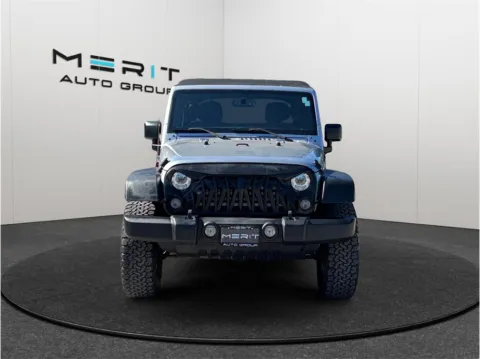 Another view of 2017 Jeep Wrangler Unlimited Sport SUV 4D for sale in Jacksonville, FL at Merit Auto Group Atlantic