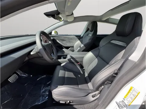 Photos of 2025 Tesla Model 3 Performance Sedan 4D for sale in Jacksonville, FL at Merit Auto Group Atlantic