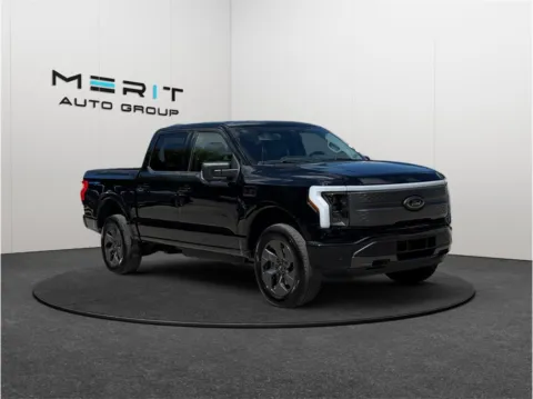 Black 2022 Ford F-150 Lightning XLT Pickup 4D 5 1/2 ft for sale in Jacksonville, FL