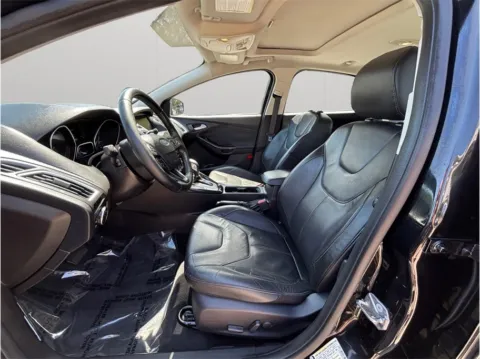 Photos of 2015 Ford Focus Titanium Hatchback 4D for sale in Jacksonville, FL at Merit Auto Group Atlantic