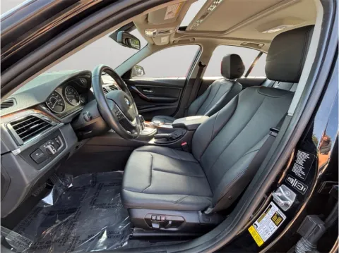 Photos of 2014 BMW 3 Series 328i Sedan 4D for sale in Jacksonville, FL at Merit Auto Group Atlantic