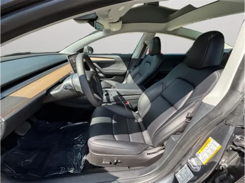 Photos of 2023 Tesla Model 3 Standard Sedan 4D for sale in Jacksonville, FL at Merit Auto Group Atlantic