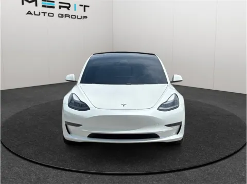 Another view of 2021 Tesla Model 3 Standard Range Plus Sedan 4D for sale in Jacksonville, FL at Merit Auto Group Atlantic