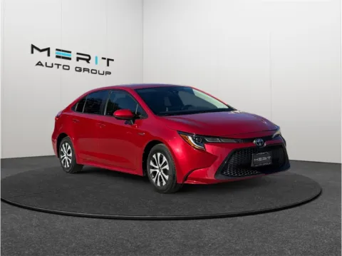 Red 2020 Toyota Corolla Hybrid LE Sedan 4D for sale in Jacksonville, FL
