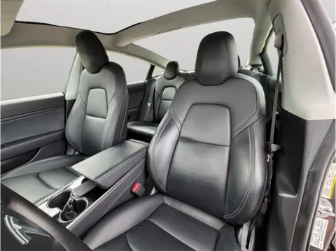 Photos of 2019 Tesla Model 3 Standard Range Sedan 4D for sale in Jacksonville, FL at Merit Auto Group Atlantic